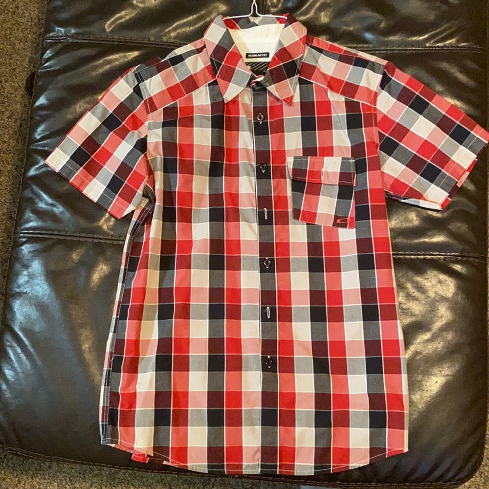Oakley short sleeve button up shirt.